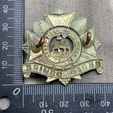 Load image into Gallery viewer, Original WW1 British Army 1st Herts Volunteer Bedfordshire Regiment Cap Badge - The Militaria Shop