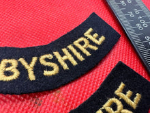 Load image into Gallery viewer, Original WW2 British Home Front Civil Defence Derbyshire Shoulder Title Pair - The Militaria Shop