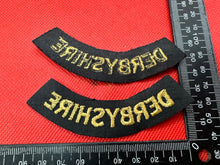 Load image into Gallery viewer, Original WW2 British Home Front Civil Defence Derbyshire Shoulder Title Pair - The Militaria Shop