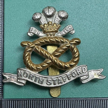 Load image into Gallery viewer, Original WW2 British Army North Stafford Regiment Cap Badge - The Militaria Shop