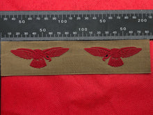 Load image into Gallery viewer, Original WW2 British RAF Tropical Royal Air Force Unissued Shoulder Eagle Badges - The Militaria Shop