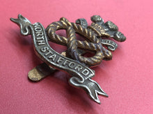 Load image into Gallery viewer, Original WW2 British Army North Stafford Regiment Cap Badge - The Militaria Shop