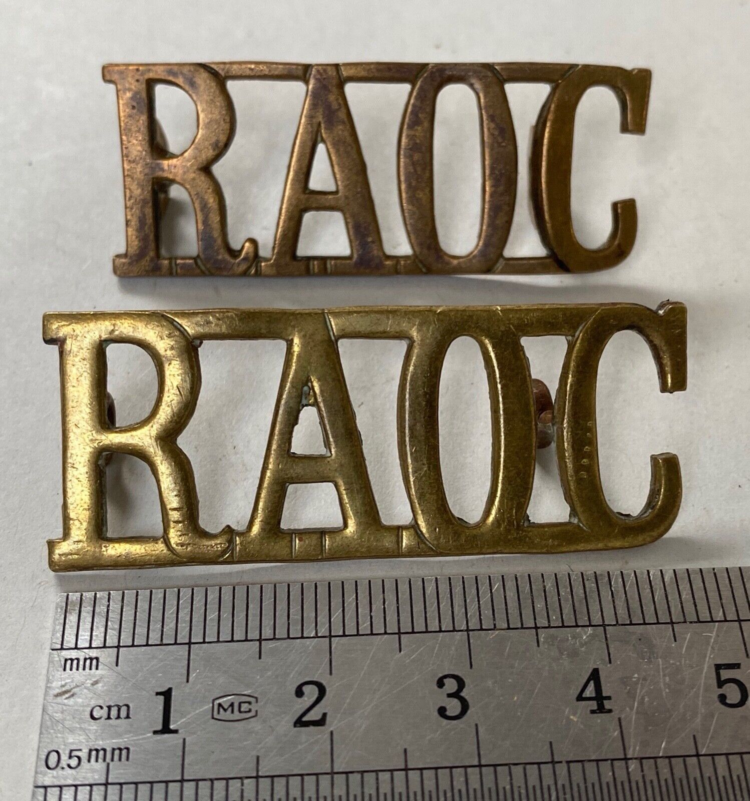 British Army WW1 RAOC Royal Army Ordnance Corps brass shoulder titles. - The Militaria Shop