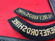 Load image into Gallery viewer, Original WW2 British Home Front Civil Defence Herefordshire Shoulder Titles - The Militaria Shop
