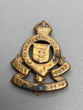Load image into Gallery viewer, Original British Army WW2 RAOC Royal Army Ordnance Corps Cap Badge - The Militaria Shop