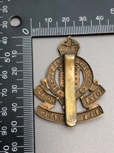 Load image into Gallery viewer, Original British Army WW2 RAOC Royal Army Ordnance Corps Cap Badge - The Militaria Shop