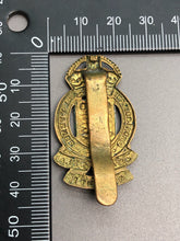 Load image into Gallery viewer, Original British Army WW2 RAOC Royal Army Ordnance Corps Cap Badge - The Militaria Shop