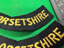Load image into Gallery viewer, Original WW2 British Home Front Civil Defence Dorsetshire Shoulder Titles - The Militaria Shop