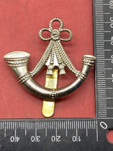 Load image into Gallery viewer, WW1 / WW2 British Army White Metal Light Infantry Cap Badge. - The Militaria Shop