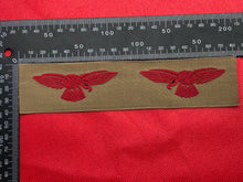 Load image into Gallery viewer, Original WW2 British RAF Tropical Royal Air Force Unissued Shoulder Eagle Badges - The Militaria Shop
