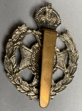 Charger l'image dans la galerie, A British Army 19th County of London white metal cap badge. - The Militaria Shop