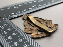 Load image into Gallery viewer, Original British Army WW2 RAOC Royal Army Ordnance Corps Cap Badge - The Militaria Shop