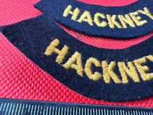 Load image into Gallery viewer, Original WW2 British Home Front Civil Defence Hackney Shoulder Titles - The Militaria Shop