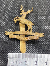 Load image into Gallery viewer, Original British Army WW1 HUNTINGDONSHIRE REGIMENT Cap Badge - The Militaria Shop