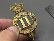 Load image into Gallery viewer, Original British Army - 11th Regiment of Foot North Devon Glengarry Cap Badge - The Militaria Shop