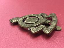 Load image into Gallery viewer, Original WW2 British Army Cap Badge - RAOC Royal Army Ordnance Corps - The Militaria Shop