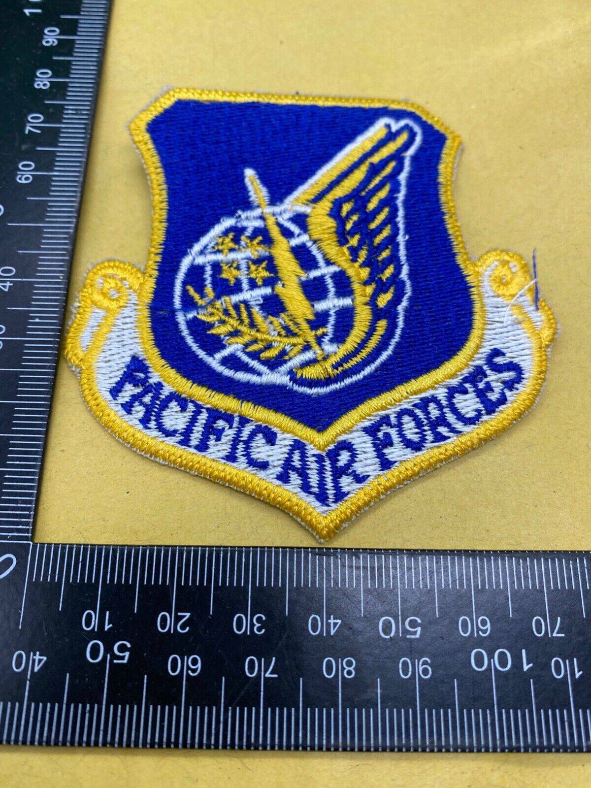 An original US Air Force PACIFIC AIR FORCES Patch/Badge. Brand New - Unissued. - The Militaria Shop