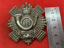 Load image into Gallery viewer, Original WW1 / WW2 British Army Highland Light Infantry Regiment Cap Badge - The Militaria Shop