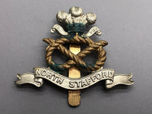 Load image into Gallery viewer, Original British Army WW2 North Stafford Cap Badge - The Militaria Shop