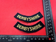 Load image into Gallery viewer, Original WW2 British Home Front Civil Defence Derbyshire Shoulder Title Pair - The Militaria Shop
