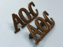 Load image into Gallery viewer, Original WW1 British Army Ordnance Corps (A.O.C.) Shoulder Titles - The Militaria Shop