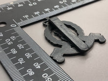 Load image into Gallery viewer, Genuine British Army Blackened Adjutant General's Corps Cap Badge - The Militaria Shop