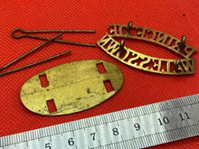 Load image into Gallery viewer, Original PRINCE OF WALES'S OWN Brass Shoulder Title with Rear Plate and Pin - The Militaria Shop