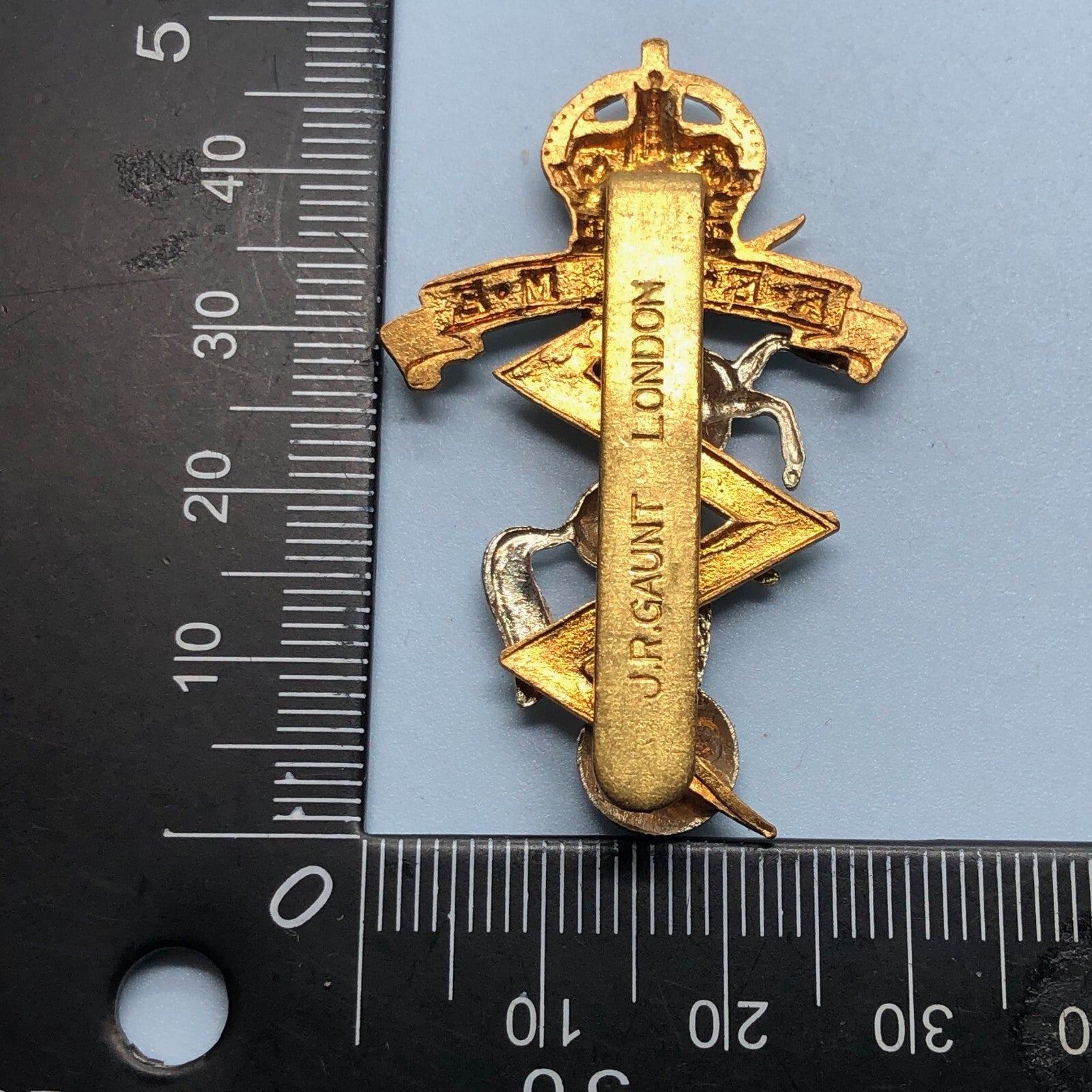 Genuine British Army Cap Badge - Royal Electrical and Mechanical Engineers - The Militaria Shop