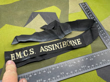 Lade das Bild in den Galerie-Viewer, Original British Royal Navy Cap Tally for HMS Assiniboine - The Militaria Shop