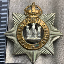 Load image into Gallery viewer, Original WW1 British Army The Devonshire Regiment Cap Badge - The Militaria Shop