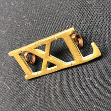 Lade das Bild in den Galerie-Viewer, Original WW1 British Army Brass Shoulder Title - 9th Lancers IXL Regiment - The Militaria Shop