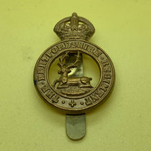 Load image into Gallery viewer, Original WW1 British Army Cap Badge - Hertfordshire Regiment - The Militaria Shop