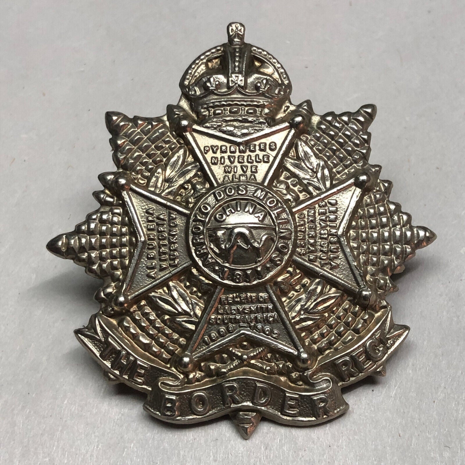 Original WW1 British Army Border Regiment Cap Badge - The Militaria Shop