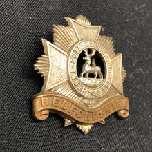 Load image into Gallery viewer, Genuine WW2 British Army Brass Cap Badge - Bedfordshire and Hertfordshire Regime - The Militaria Shop
