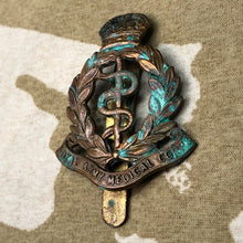 Load image into Gallery viewer, Genuine British Army Cap Badge - Royal Army Medical Corps - The Militaria Shop