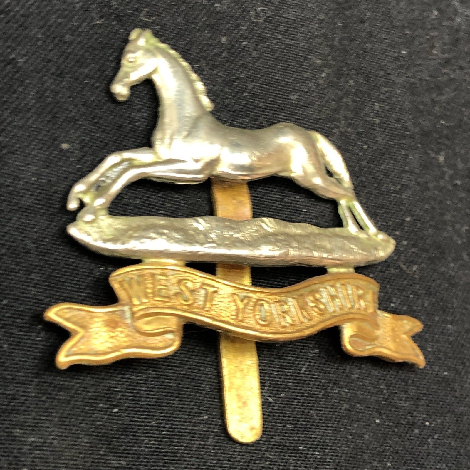 Genuine WW2 British Army Brass Cap Badge - West Yorkshire Regiment - The Militaria Shop