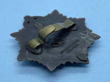 Load image into Gallery viewer, Original WW2 British Army GVI Royal Army Service Corps Plastic Economy Cap Badge - The Militaria Shop