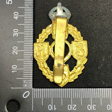 Load image into Gallery viewer, Original British Army Cap Badge - Royal Electrical and Mechanical Engineers - The Militaria Shop