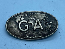 Load image into Gallery viewer, Vintage G A Initials on World Map Metal Badge - 'Whatsoever' on Reverse - The Militaria Shop