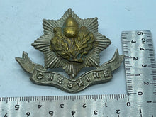 Load image into Gallery viewer, Original British Army WW1 Cheshire Regiment Cap Badge - The Militaria Shop