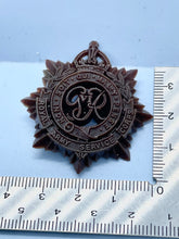 Load image into Gallery viewer, Original WW2 British Army GVI Royal Army Service Corps Plastic Economy Cap Badge - The Militaria Shop