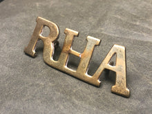 Lade das Bild in den Galerie-Viewer, Genuine British Army Brass Shoulder Title - Royal Horse Artillery RHA - The Militaria Shop