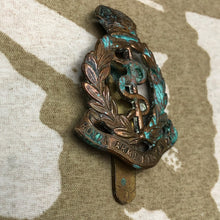 Load image into Gallery viewer, Genuine British Army Cap Badge - Royal Army Medical Corps - The Militaria Shop