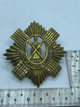 Load image into Gallery viewer, Original British Army WW1 / WW2 The Royal Scots Regiment Cap Badge - The Militaria Shop