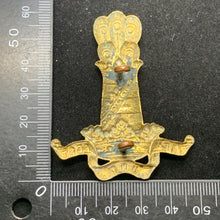 Load image into Gallery viewer, Original WW1 British Army Cap Badge - 11th Hussars - The Militaria Shop