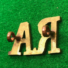 Load image into Gallery viewer, Original WW2 British Army Brass Shoulder Title - Royal Artillery - RA - The Militaria Shop