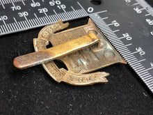 Load image into Gallery viewer, Original WW1 British Army Ordnance Corps Cap Badge - The Militaria Shop