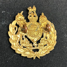 Load image into Gallery viewer, Original WW2 Canadian Army Cap Badge - Royal Army Ordnance Corps Conductors - The Militaria Shop