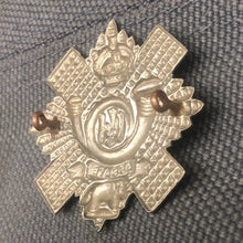 Load image into Gallery viewer, Original WW2 British Army Cap Badge - Highland Light Infantry - The Militaria Shop