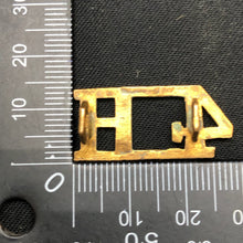 Load image into Gallery viewer, Original WW1 British Army Brass Shoulder Title - 4th Hussars - The Militaria Shop